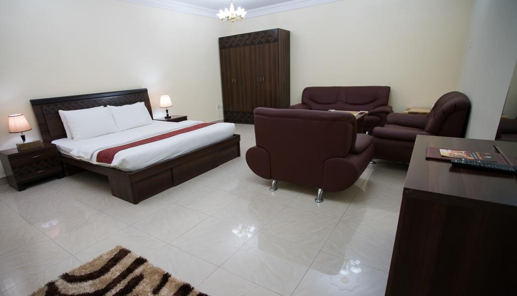 Tiger Home Hotel Apartments Maszkat Kültér fotó