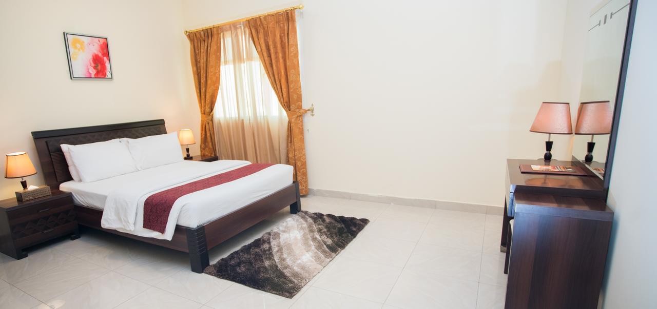 Tiger Home Hotel Apartments Maszkat Kültér fotó