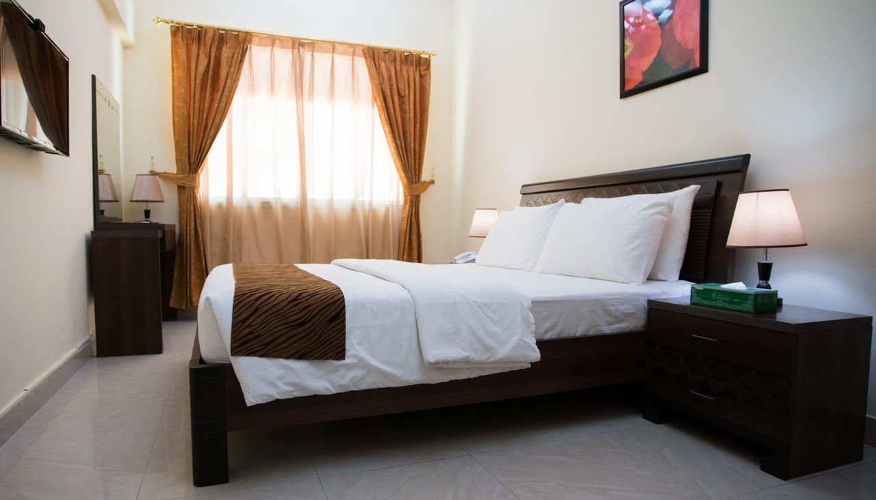 Tiger Home Hotel Apartments Maszkat Kültér fotó