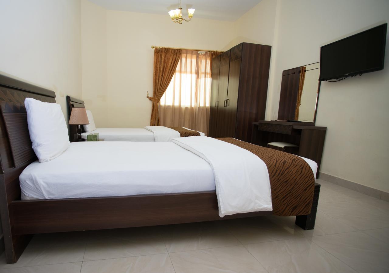 Tiger Home Hotel Apartments Maszkat Kültér fotó
