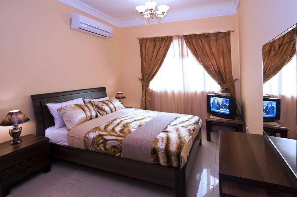 Tiger Home Hotel Apartments Maszkat Kültér fotó