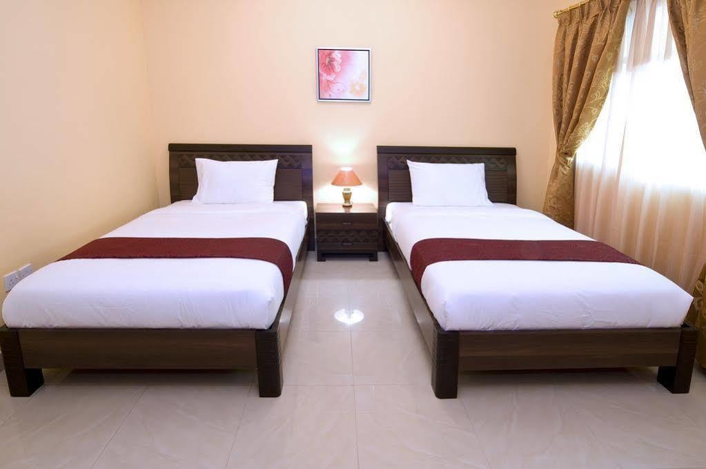 Tiger Home Hotel Apartments Maszkat Kültér fotó