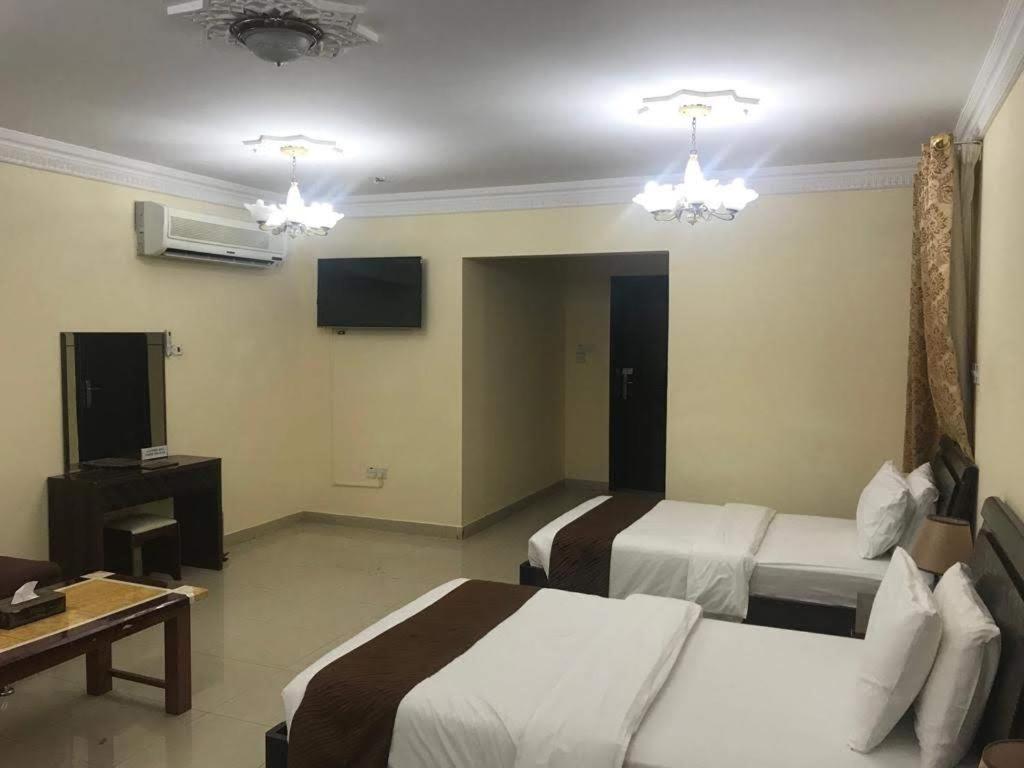 Tiger Home Hotel Apartments Maszkat Kültér fotó